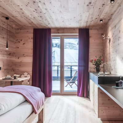 Krickerl Appartement aus Holz mit Balkon